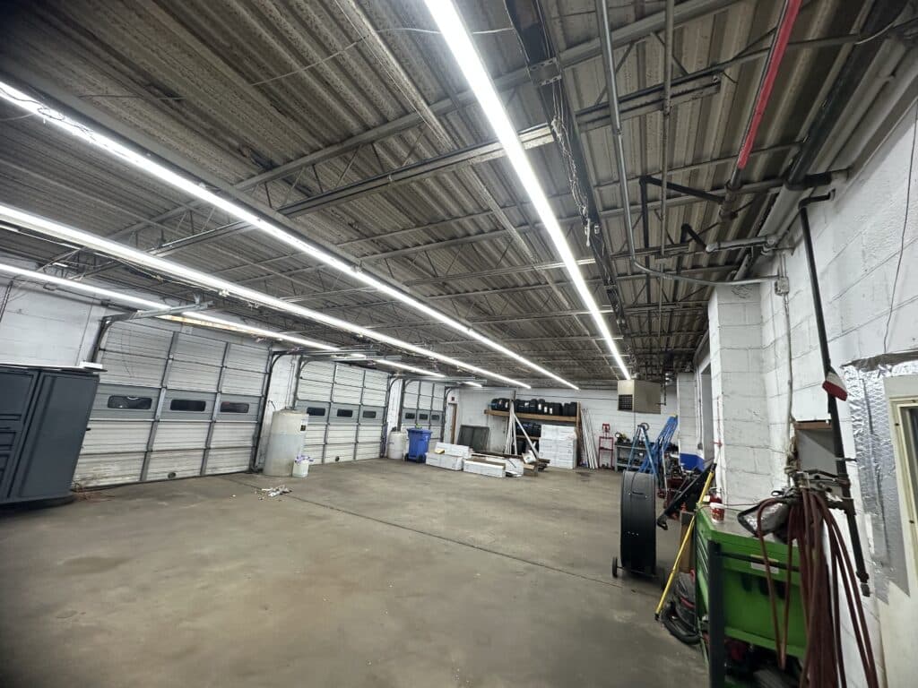 Industrial workspace with overhead LED lighting