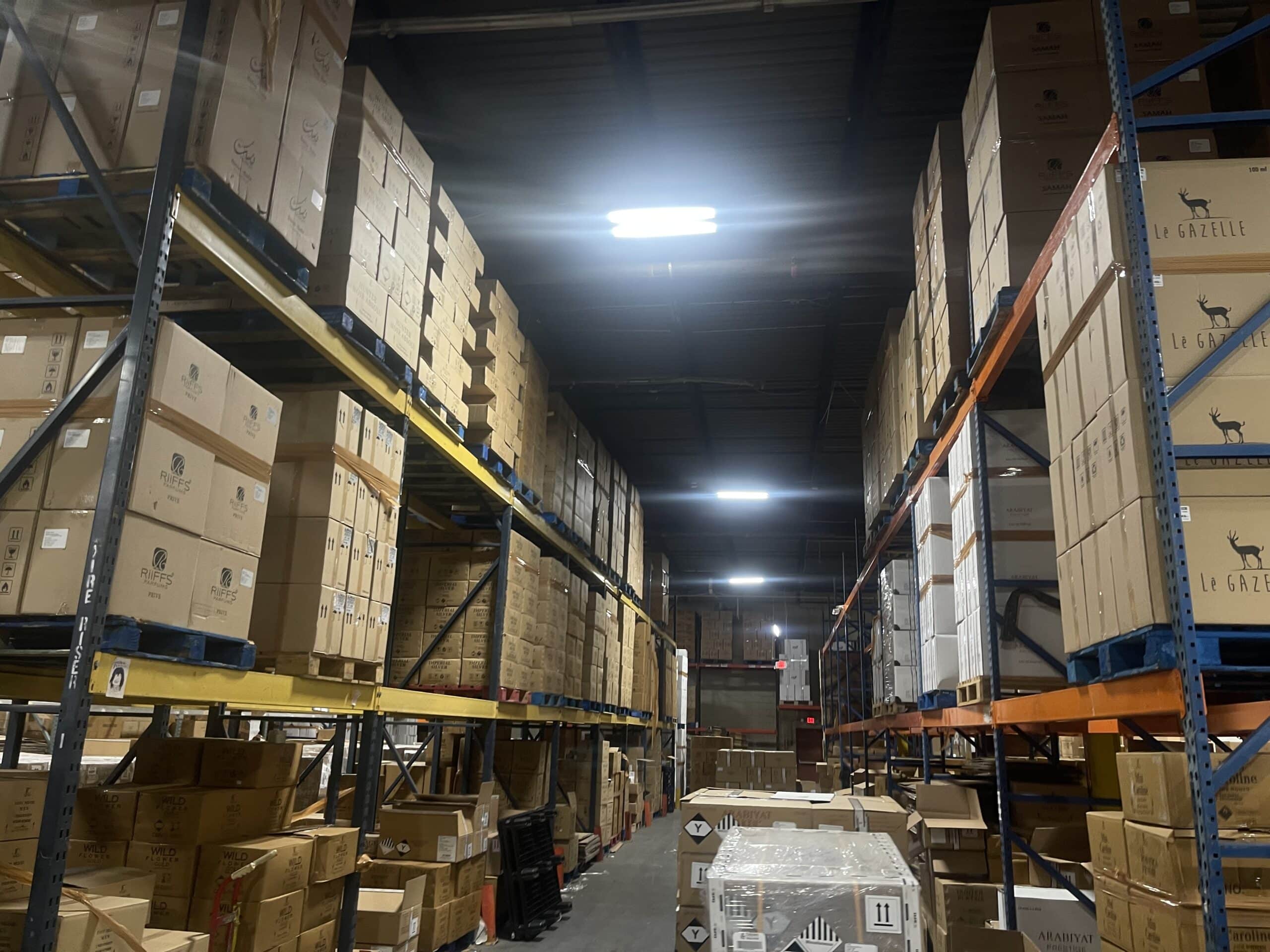 Warehouse aisle with overhead lighting