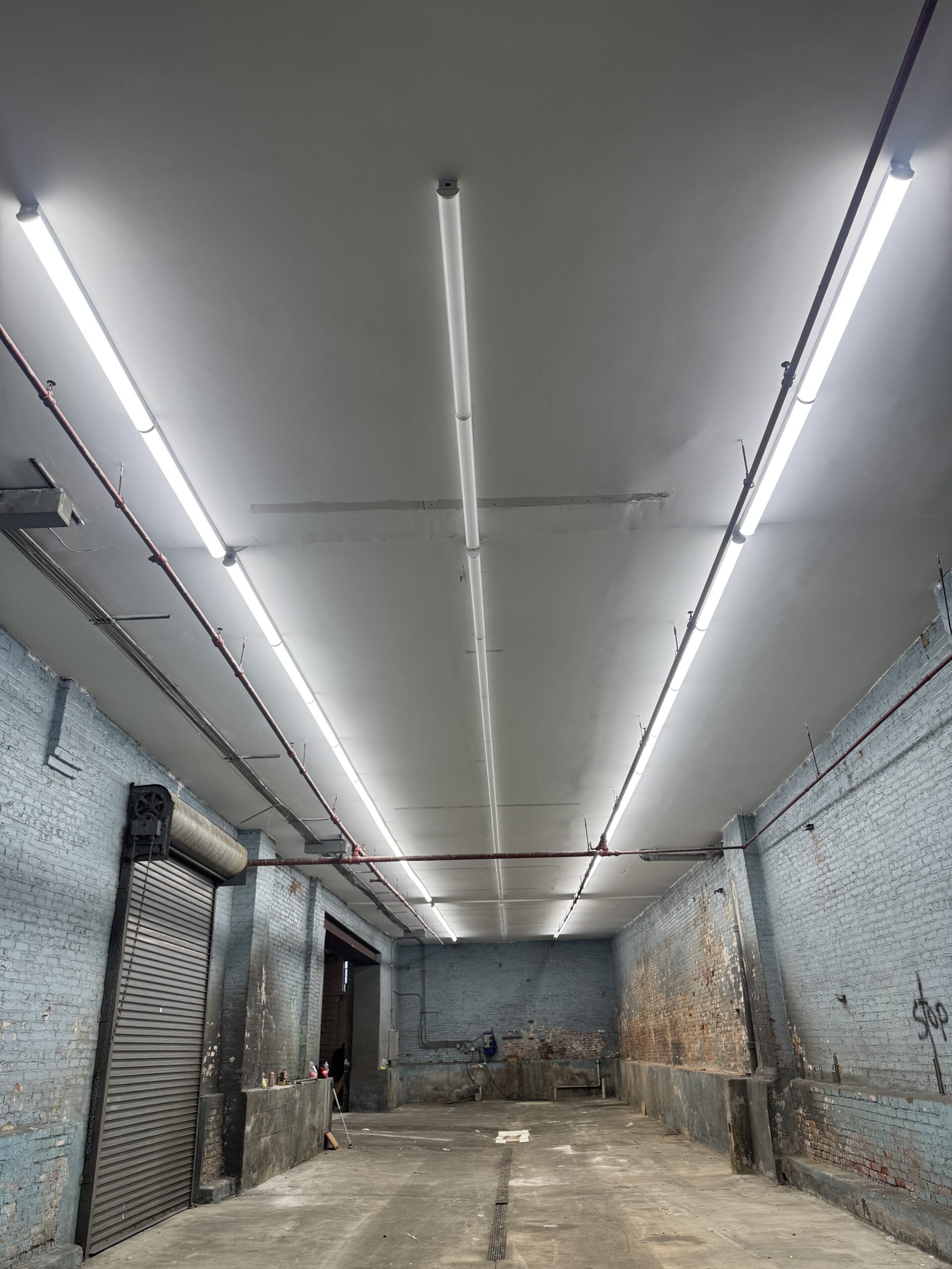 Warehouse interior with linear LED lighting